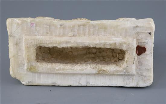 An alabaster cinerary urn cover, probably Etruscan 3rd-2nd century B.C., L. 26cm, H. 17cm